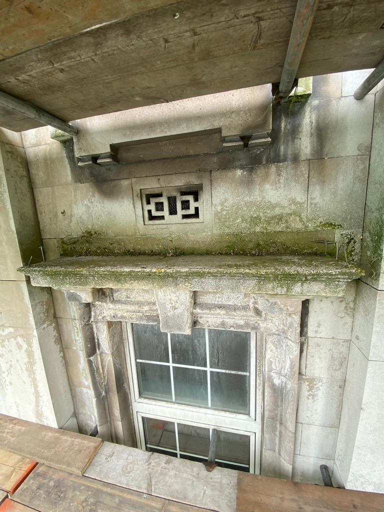 moss and litchen covered stone before Doff treatment